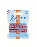 Blue and red Sajou ribbon on a white background