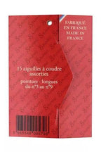 Back of red packaging of sewing needles with text indicating 'Made in France'.