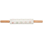 Rolling pin with floral pattern on a white background