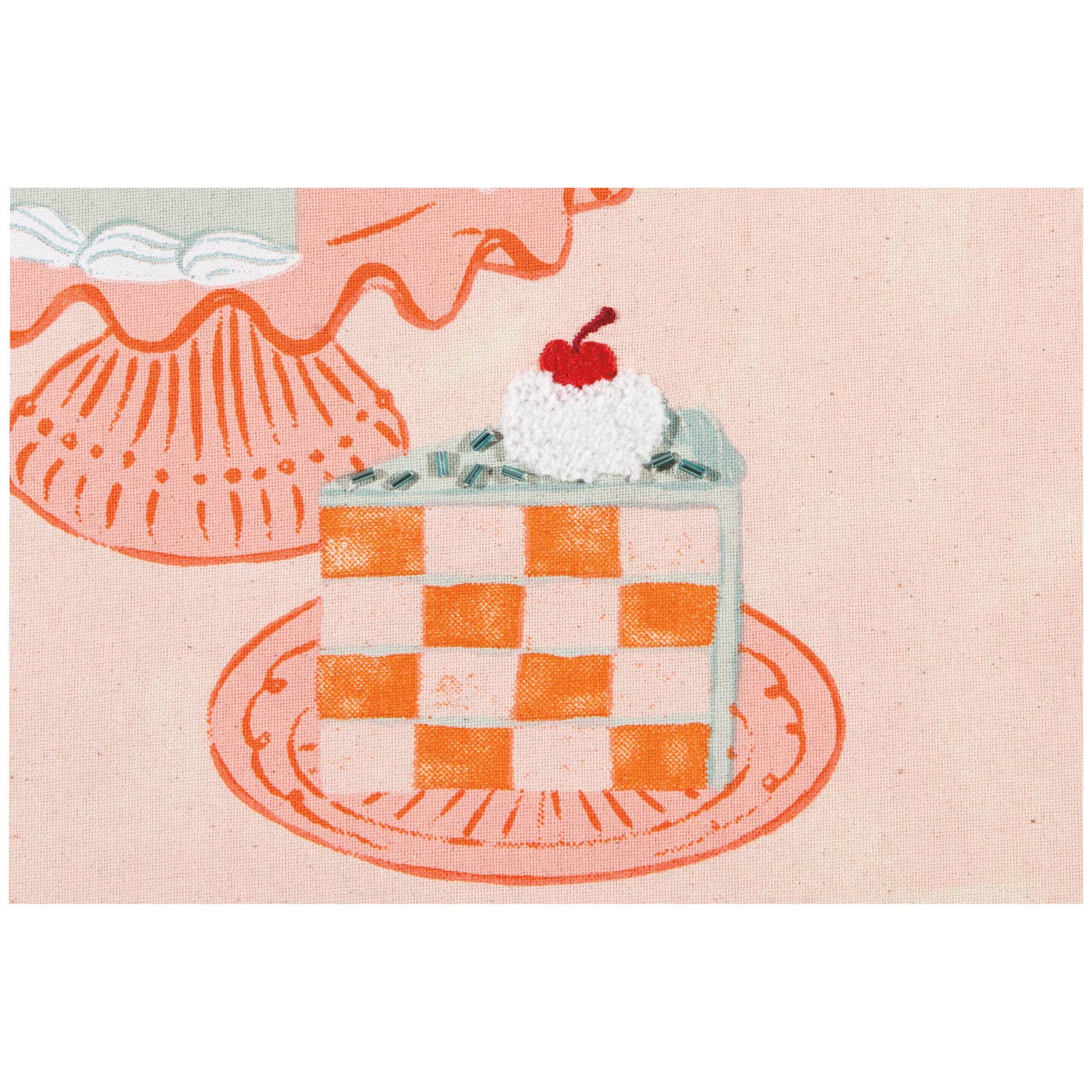 Checkered cake with whipped cream and a cherry on top on a pink background