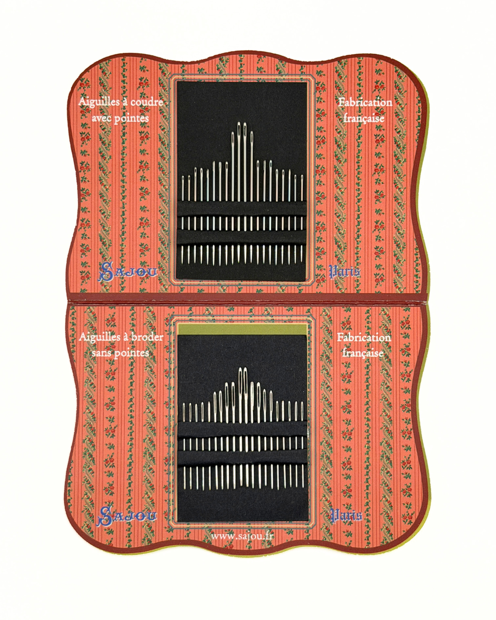 Set of sewing needles in a decorative case with a red border and green patterns.