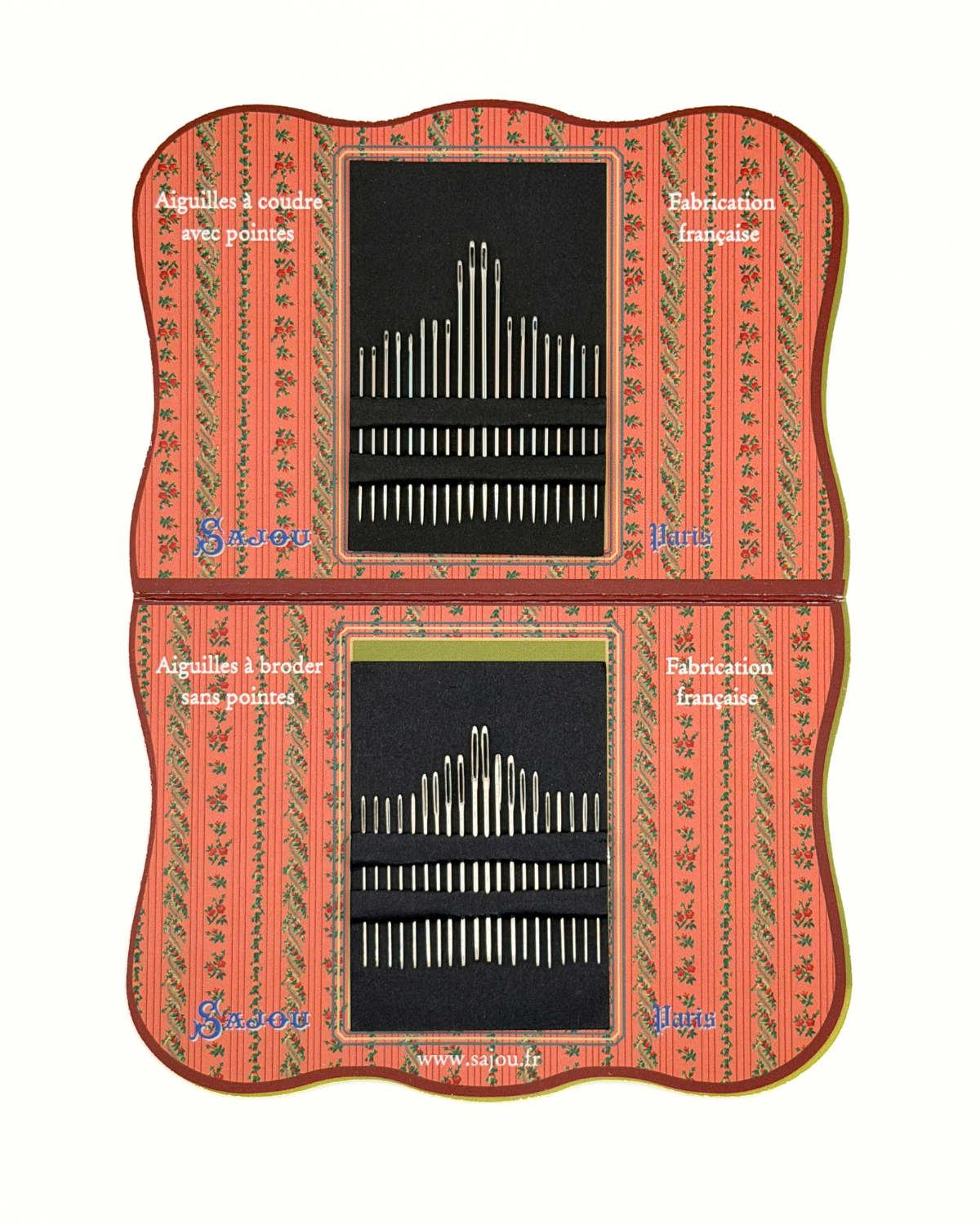 Set of sewing needles in a decorative case with a red border and green patterns.