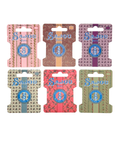 Set of six Sajou brand thread storage on a white background