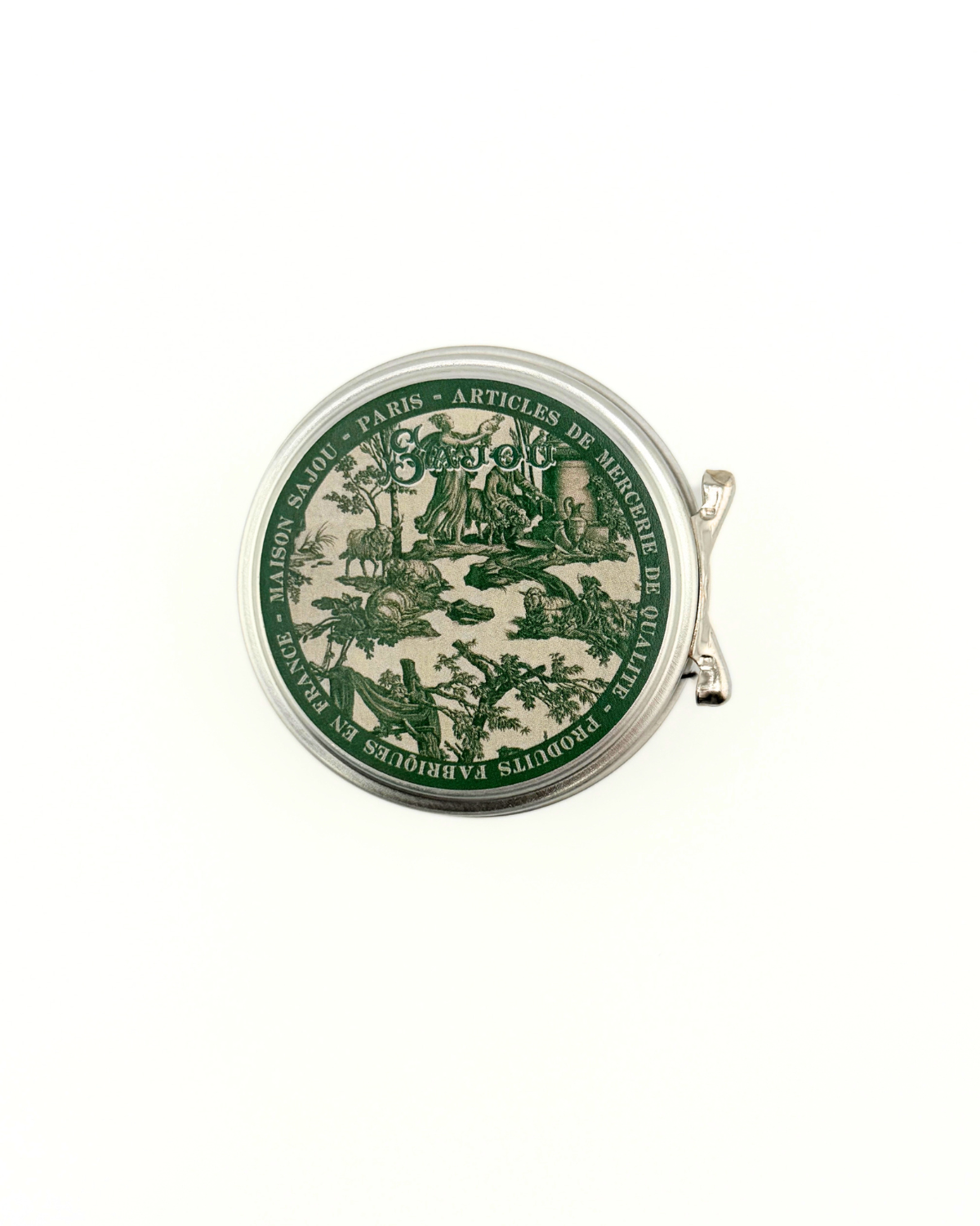 Round green and beige tin with decorative design on a white background