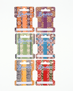 Set of six colorful Sajou thread storage cards on a white background.
