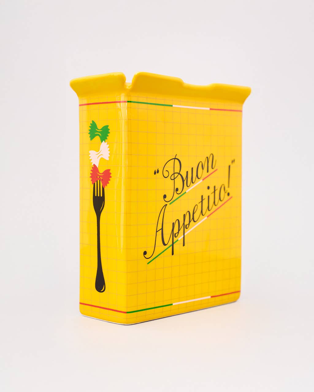 Yellow tin box with 'Buon Appetito!' text and pasta symbols on a white background