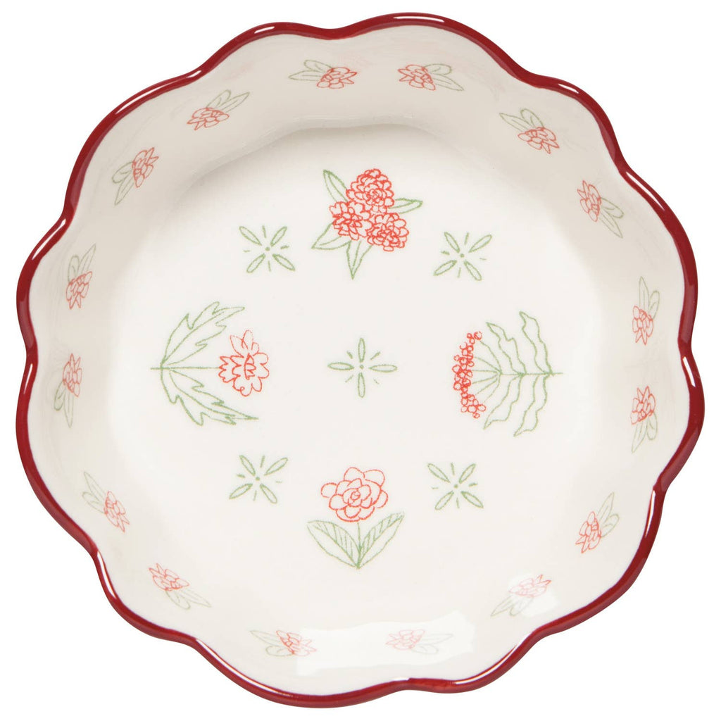 Decorative red and white ceramic dish with floral patterns on a white background