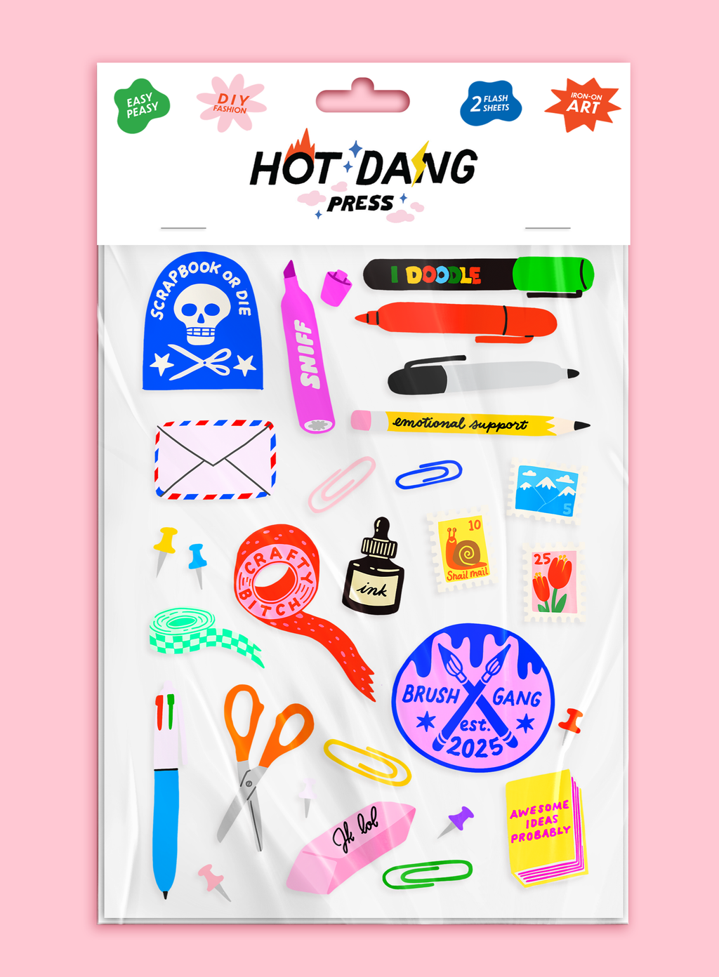 Sheet of colorful fabric stickers of stationery items a on a pink background