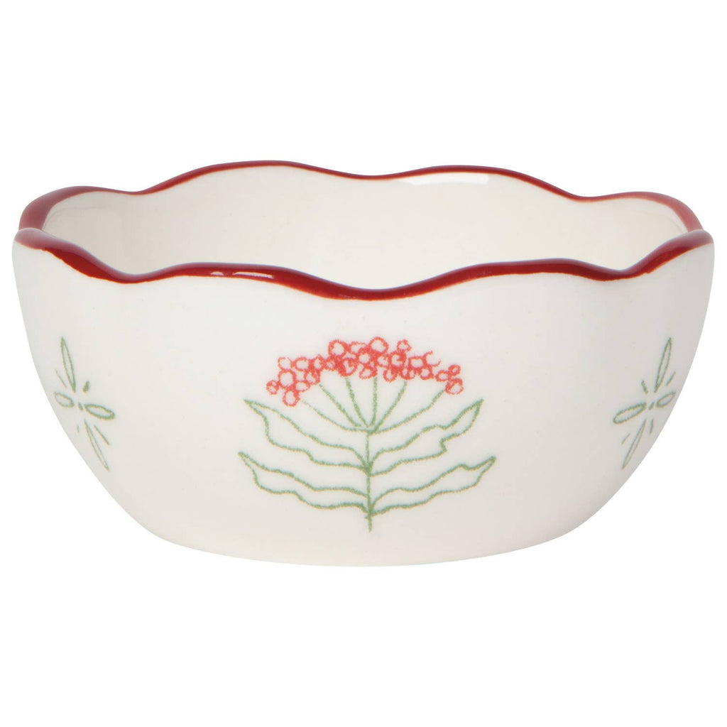 Decorative ceramic bowl with red rim and floral patterns on a white background