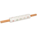 A ceramic rolling pin with a white glaze decorated with a delicate green and pink floral pattern, supported by natural light brown wooden handles, shown on a plain white background.