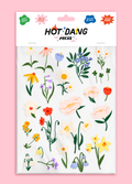 Sheet of floral fabric stickers by Hot Dang Press on a pink background