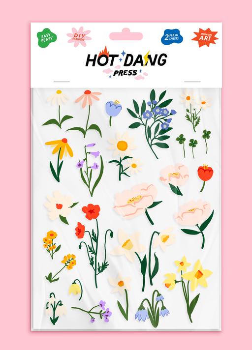 Sheet of floral fabric stickers by Hot Dang Press on a pink background