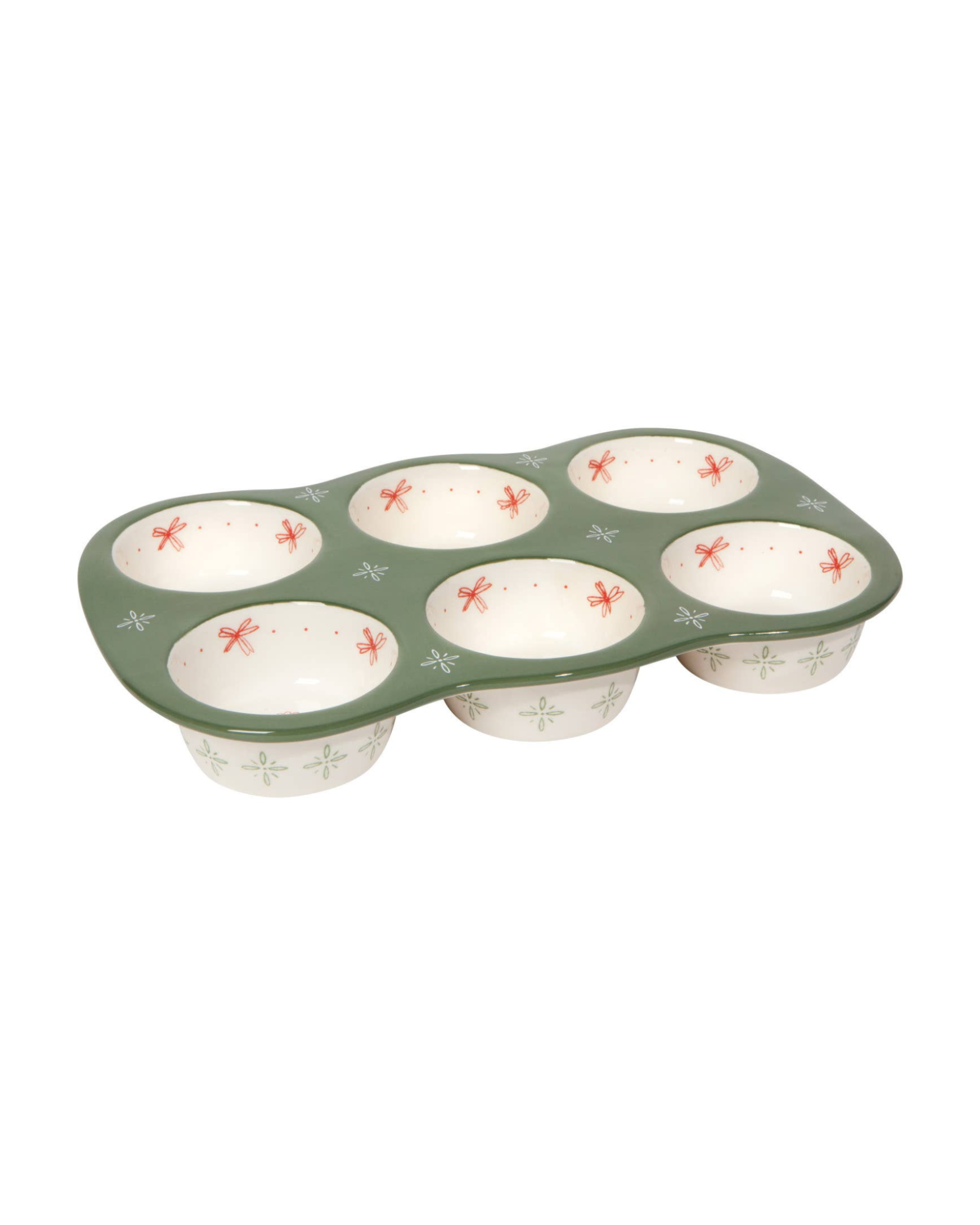 Muffin tin with decorative design on a white background