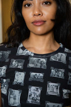 Person wearing black and gray mesh fabric top with printed black and white images of grandmas, people and objects.