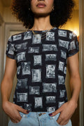 Person wearing black and gray mesh fabric top with printed black and white images of grandmas, people and objects.