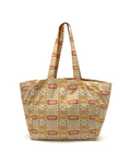 Tote bag with patterned fabric of vegetable labels of pickles, peppers, tomatoes, asparagus and onions on a white background