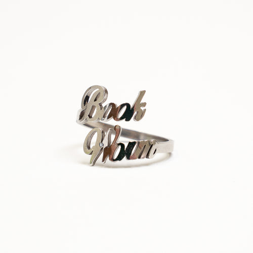 Silver Ring that spells out "book worm" 