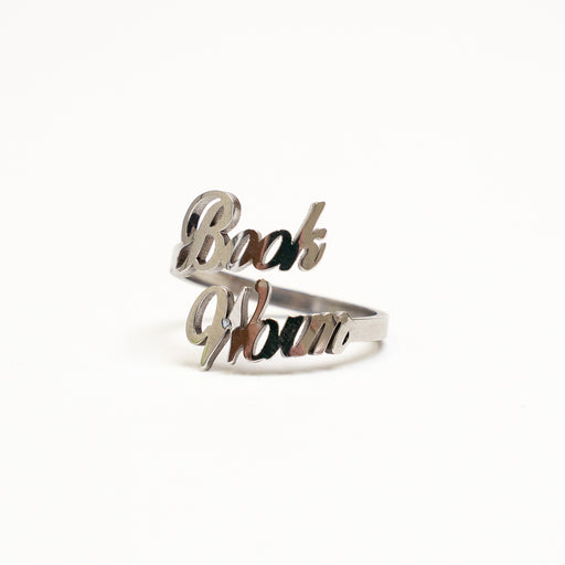 Silver Ring that spells out "book worm" 