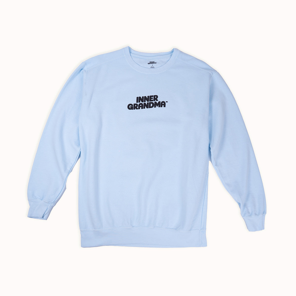Light blue sweatshirt with 'INNER GRANDMA' text on a white background