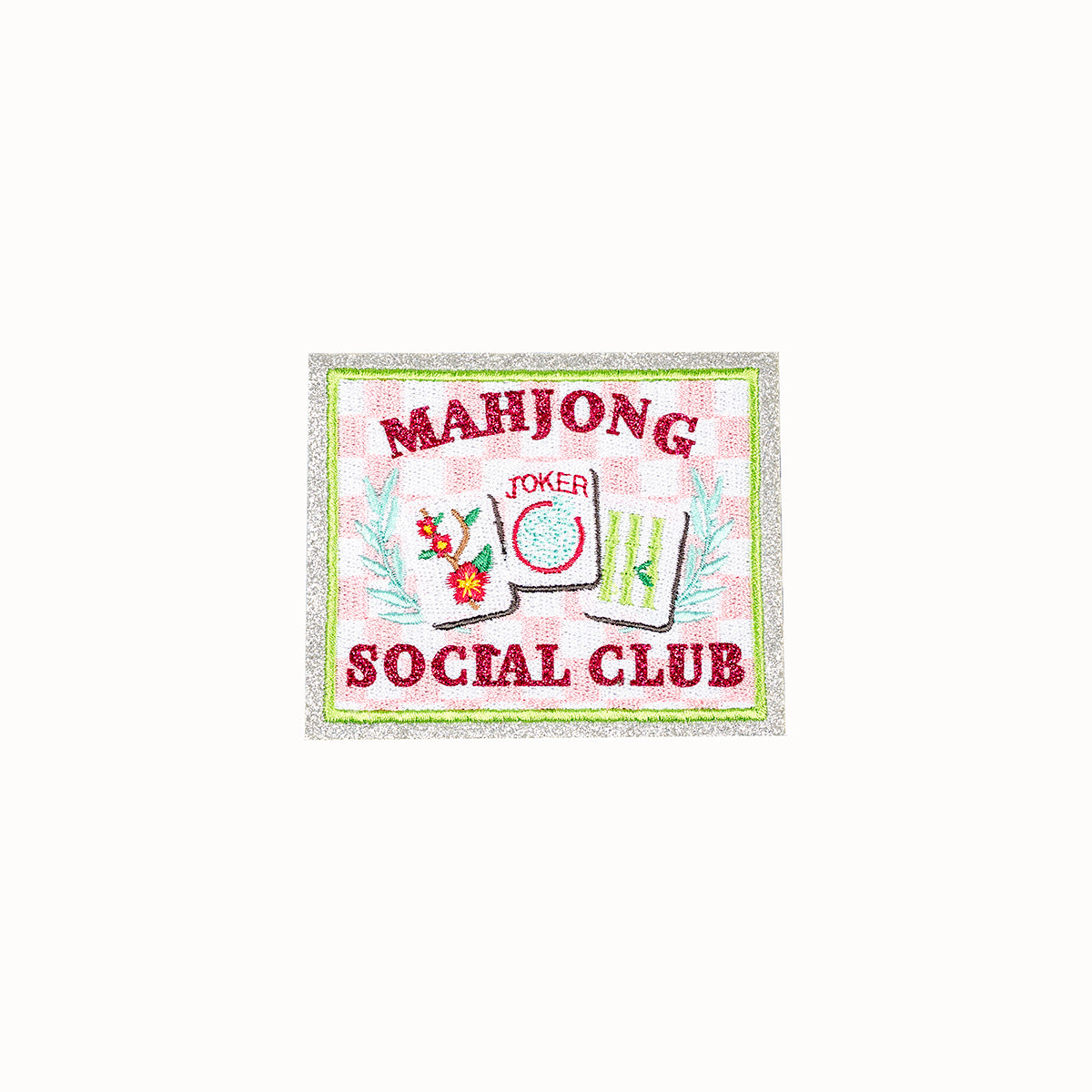 Embroidered patch with 'Mahjong Social Club' text and game pieces on a white background