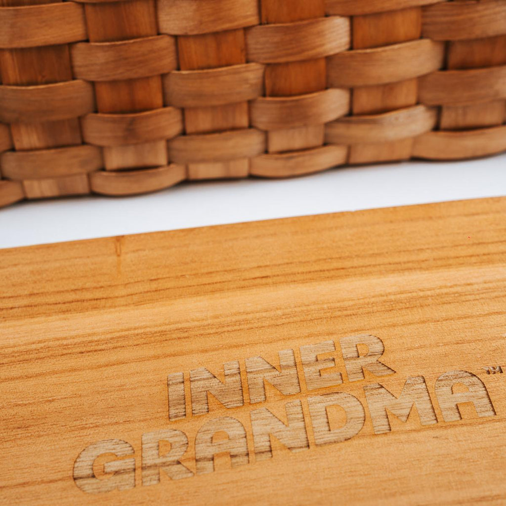 Wooden product with 'INNER GRANDMA' branding on a white background