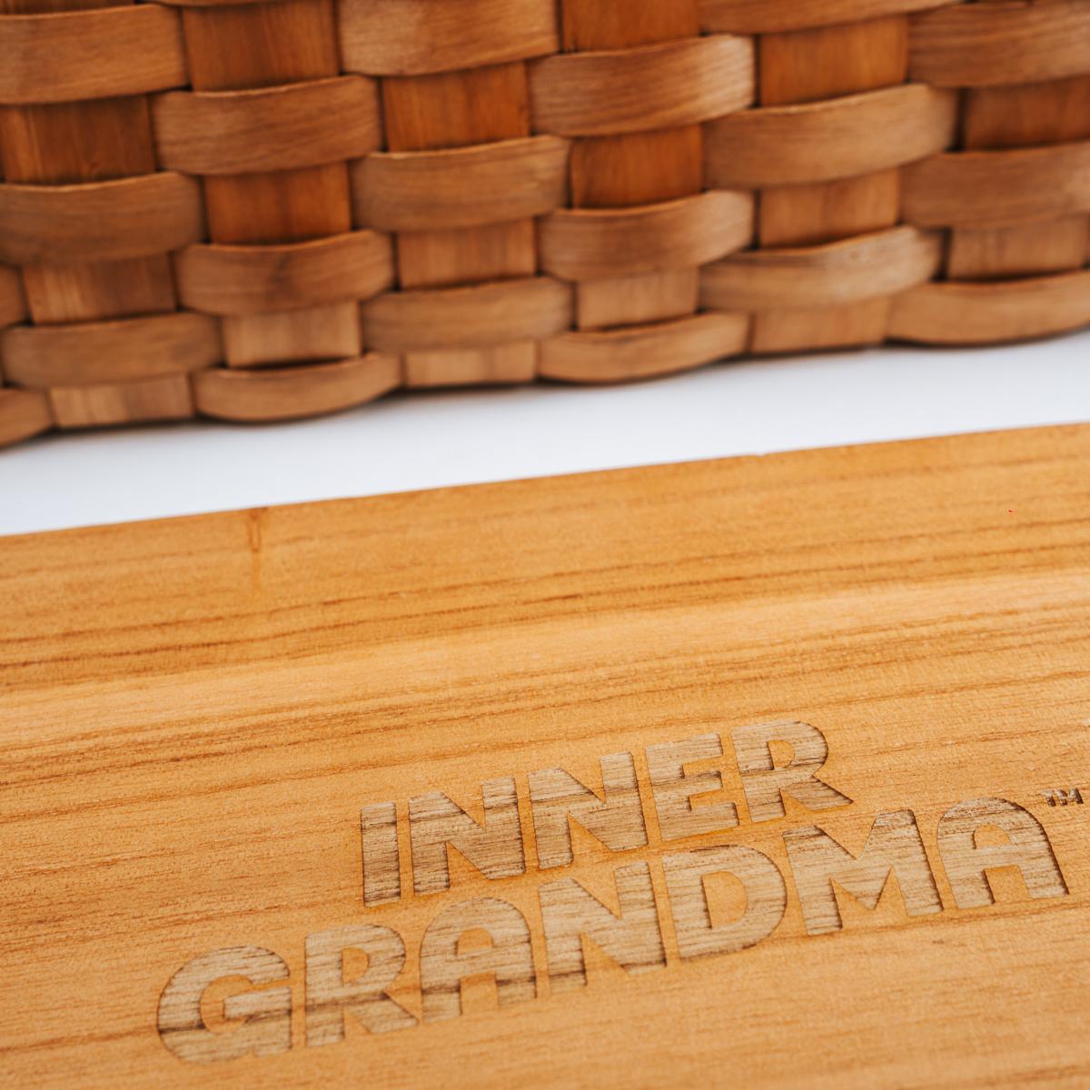 Wooden product with 'INNER GRANDMA' branding on a white background