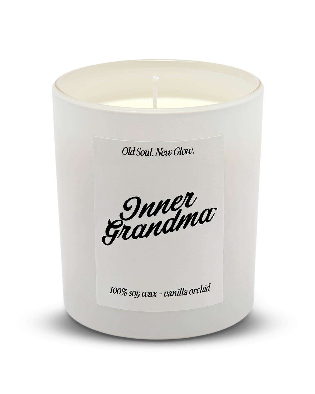White candle with 'Inner Grandma' label on a white background