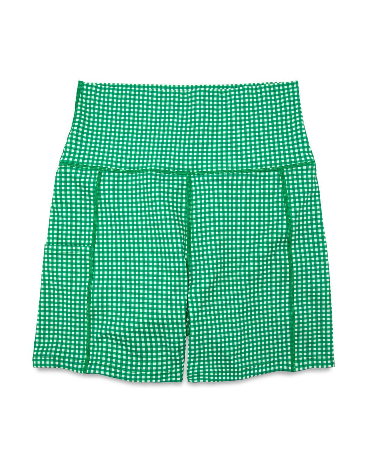 Green and white checkered shorts on a white background