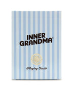 Playing cards with 'Inner Grandma' branding on a blue and white striped background