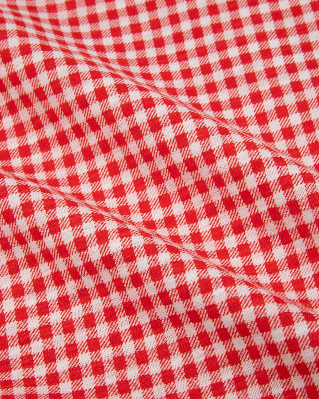 Close-up of red and white gingham fabric