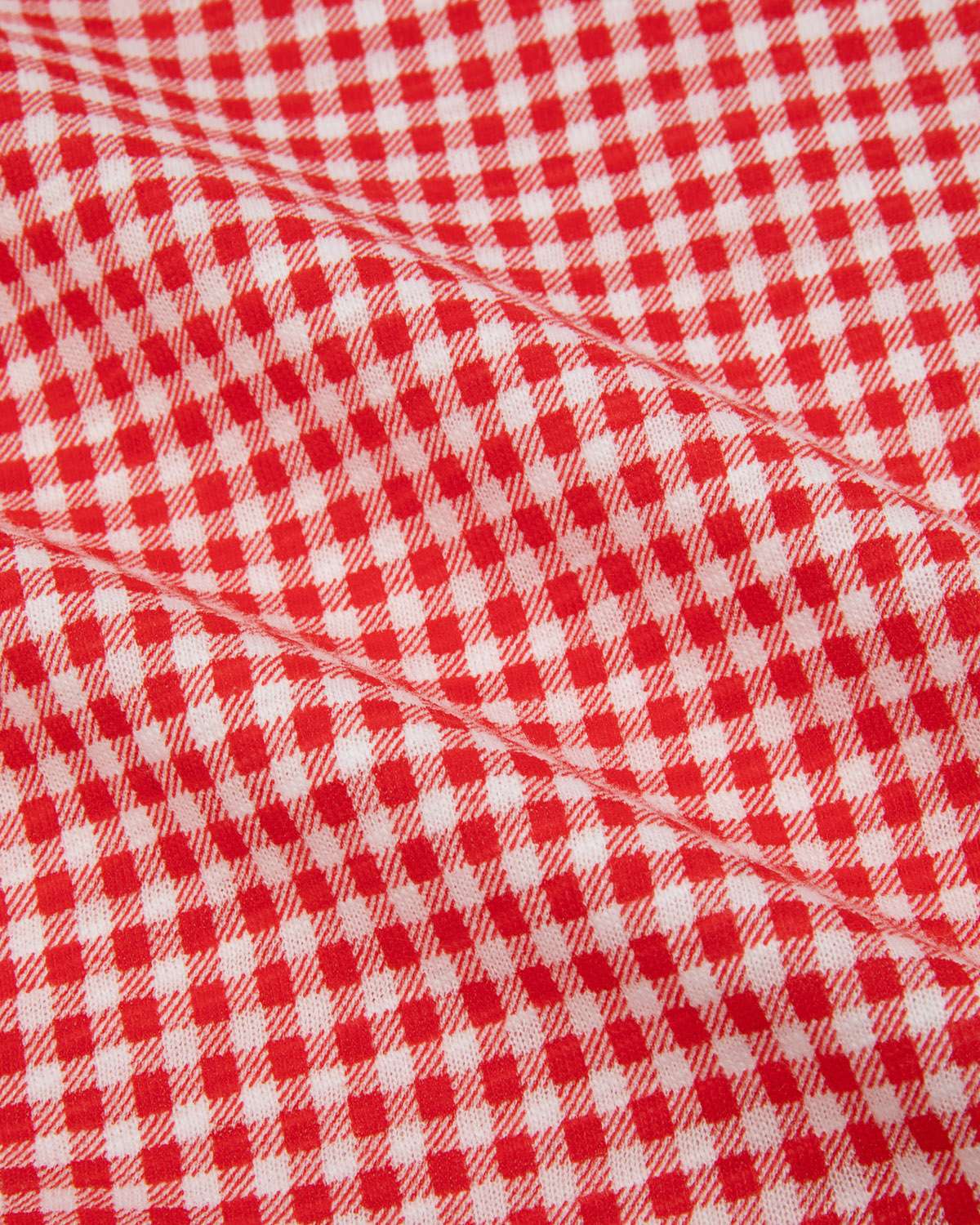 Close-up of red and white gingham fabric