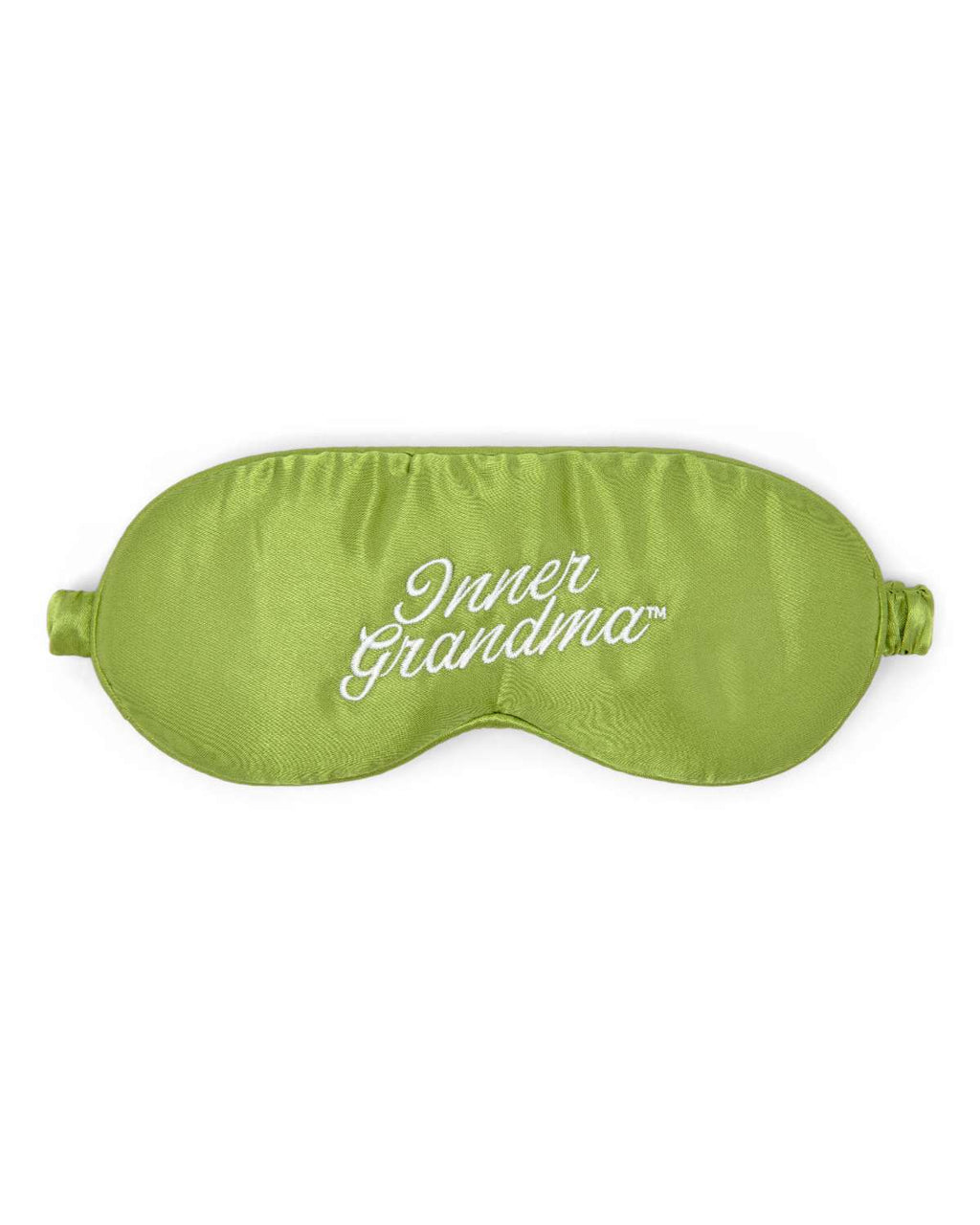 Green sleep mask with 'Inner Grandma' embroidered text on a white background