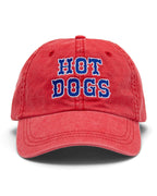 Red baseball cap with 'Hot Dogs' text in blue on a white background