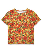 A short-sleeve crewneck t-shirt featuring an all-over floral print with red poppies, yellow flowers, and green leaves on a warm yellow background.