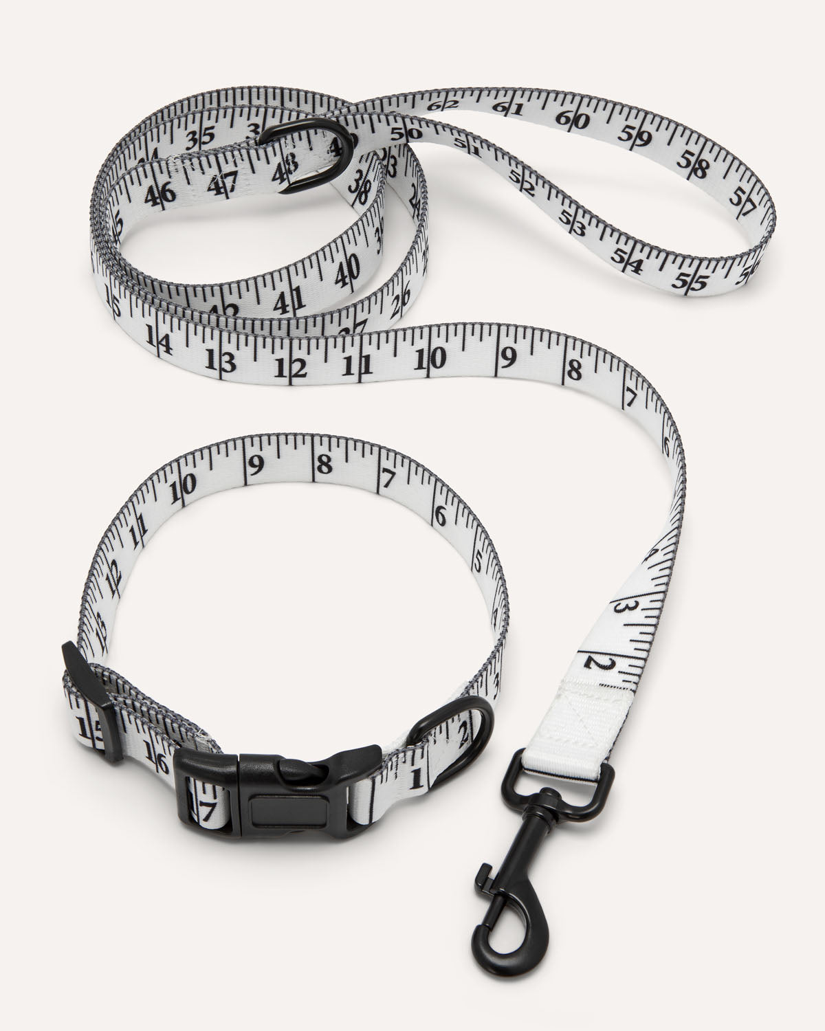 Measuring tape designed as a dog leash on a white background
