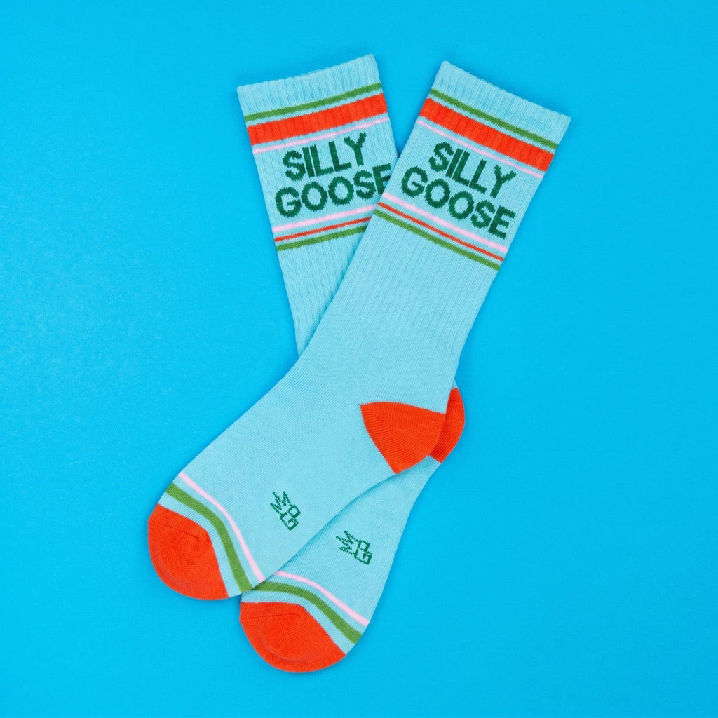 Light blue socks with 'Silly Goose' text on a blue background