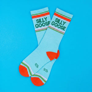 Light blue socks with 'Silly Goose' text on a blue background