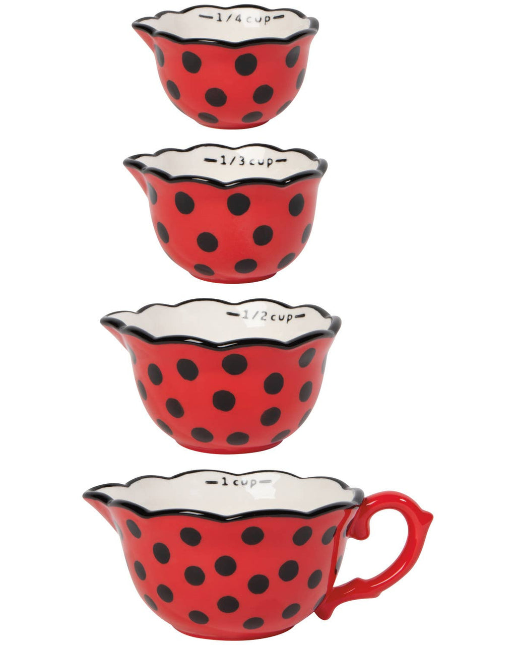 Set of four red ceramic measuring cups with black polka dots on a white background