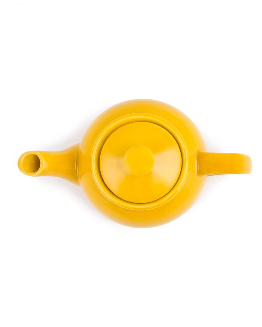 Yellow ceramic teapot on a white background