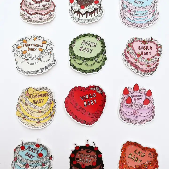 Collection of colorful vintage cakes with zodiac signs on a white background