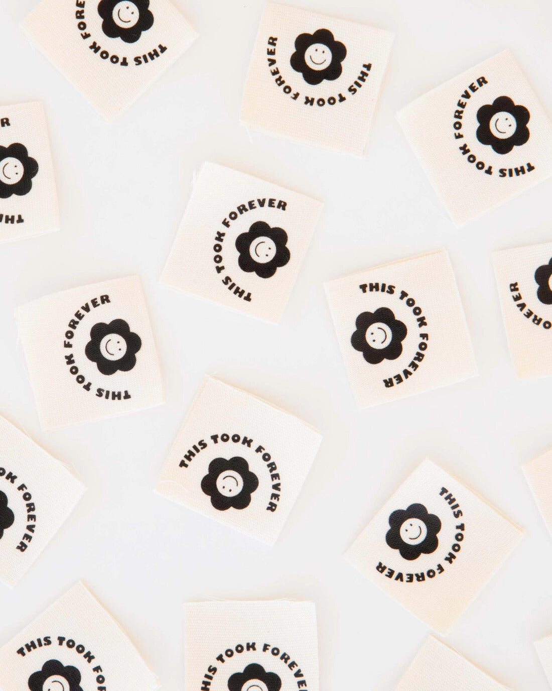 Stickers with 'This Took Too Long Forever' text and flower design on a white background
