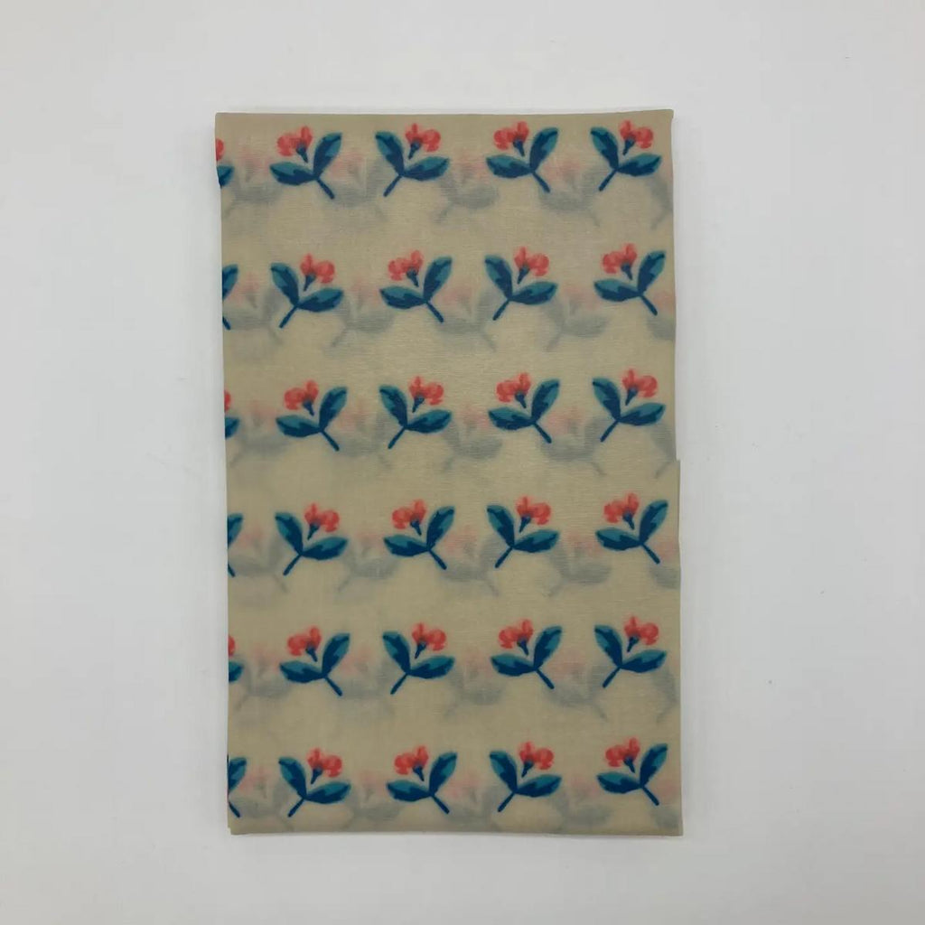 Fabric with floral pattern on a plain background