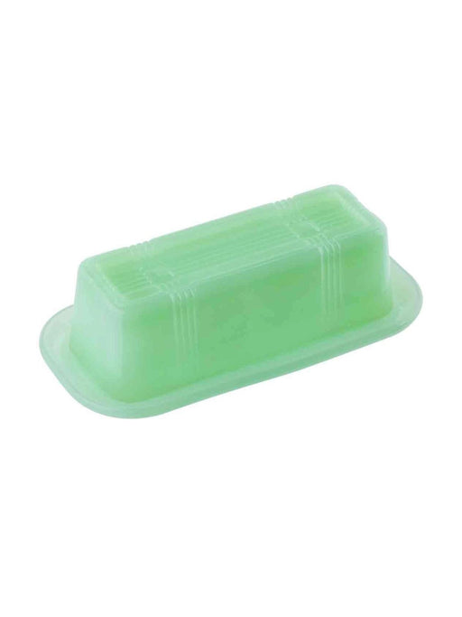 Green butter dish with lid on a white background