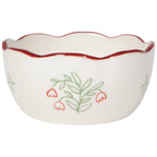 White ceramic bowl with red rim and floral design on a white background