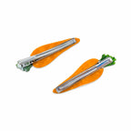 Two carrot-shaped hair clips on a white background
