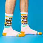 White socks with colorful text and stripes on a blue background