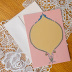 Pink and Yellow Oval card on a lace doily background