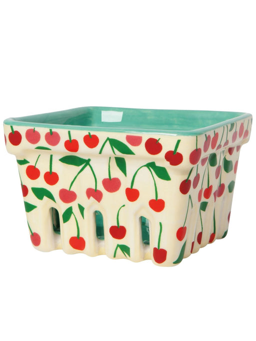 Ceramic container with cherry pattern on a white background