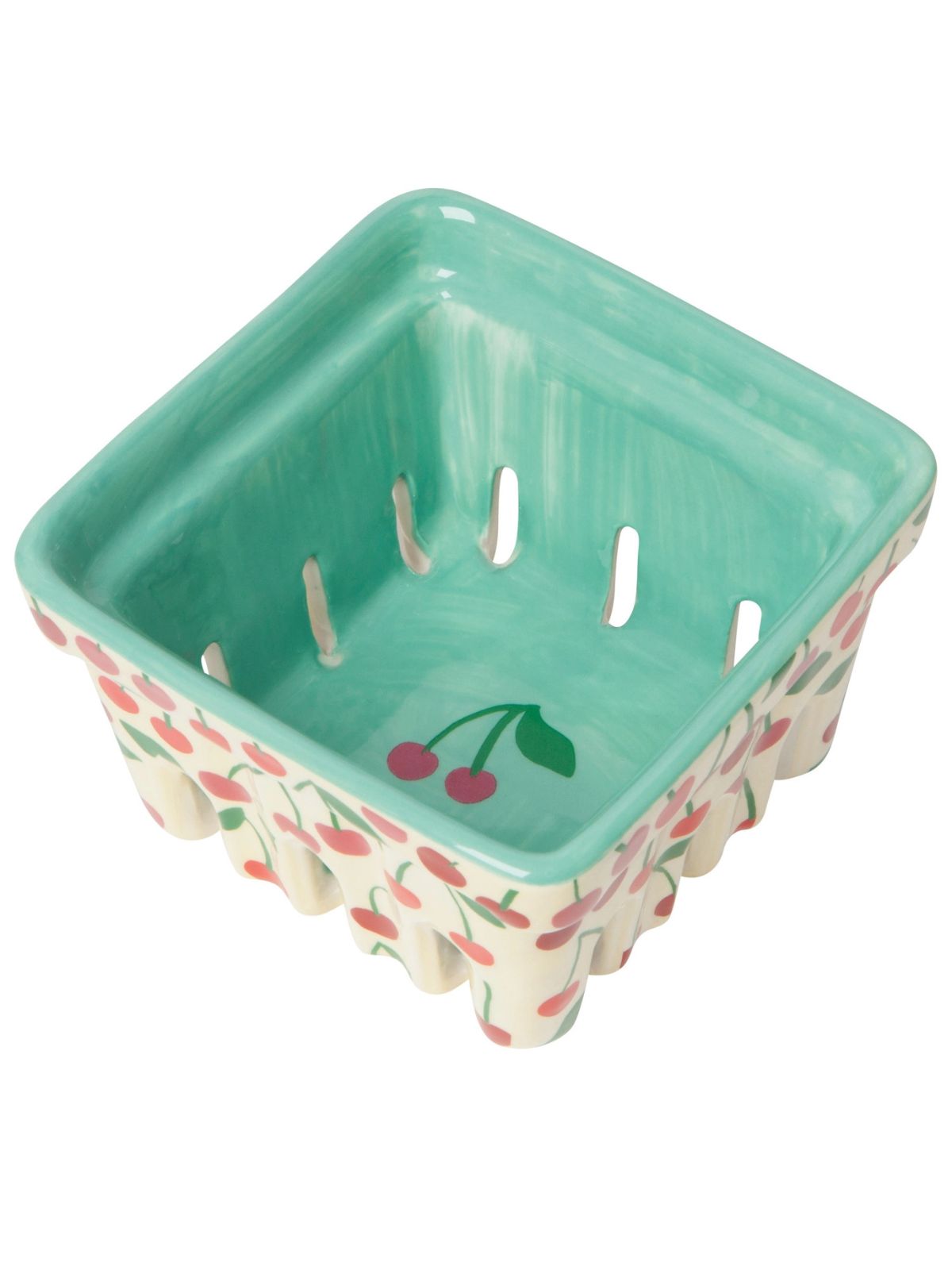 Small ceramic berry basket with a green top and cherry design on a white background