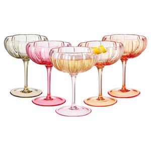 Set of colorful cocktail glasses on a white background